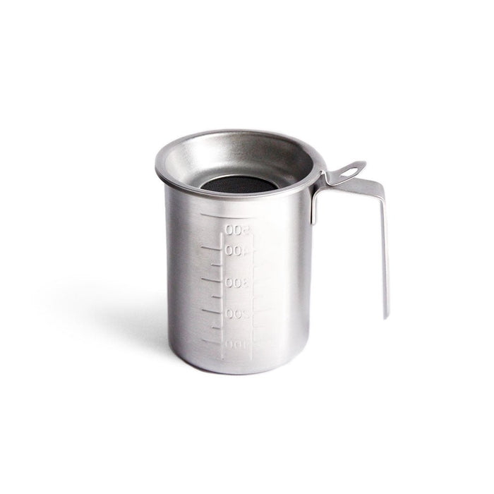 Stainless steel measuring cup with handle on a white background