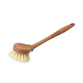 Wooden dish brush with hard bristle head on a white background