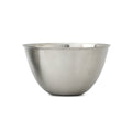 Stainless steel mixing bowl on a white background