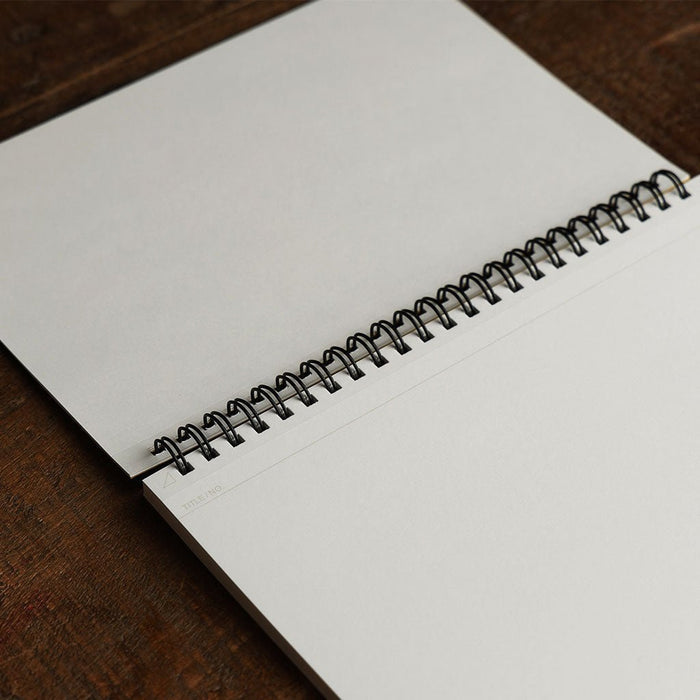 Interior of A5 spiral blank notebook.