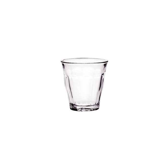 Clear glass tumbler on a white background