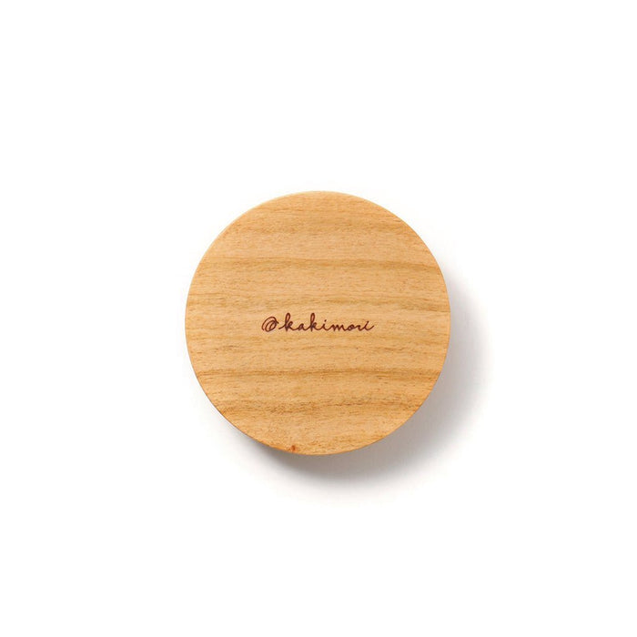 Bottom of Wooden pen rest on white background with Kakimori branding