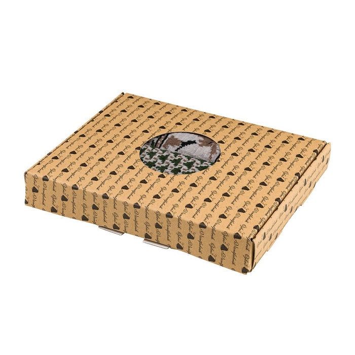 Cardboard box with patterned design on a white background